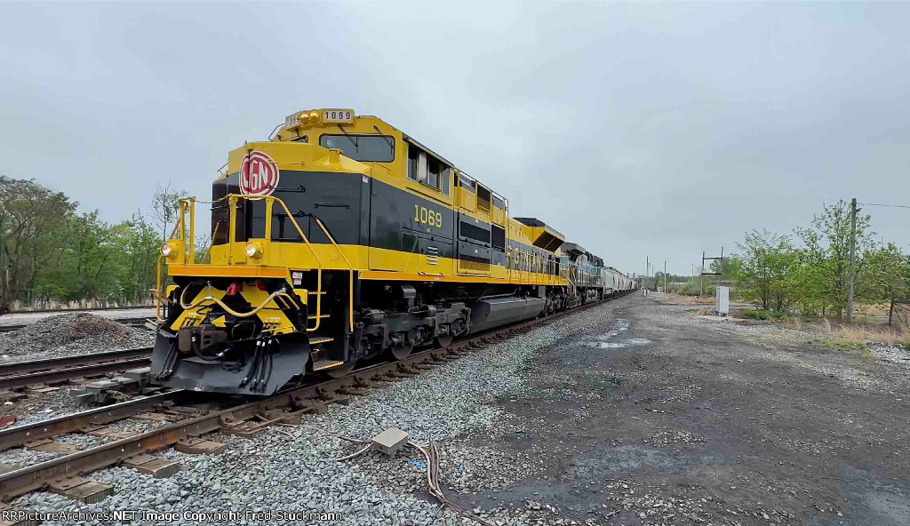 NS 1069 is set to pass the Amtrak Depot.